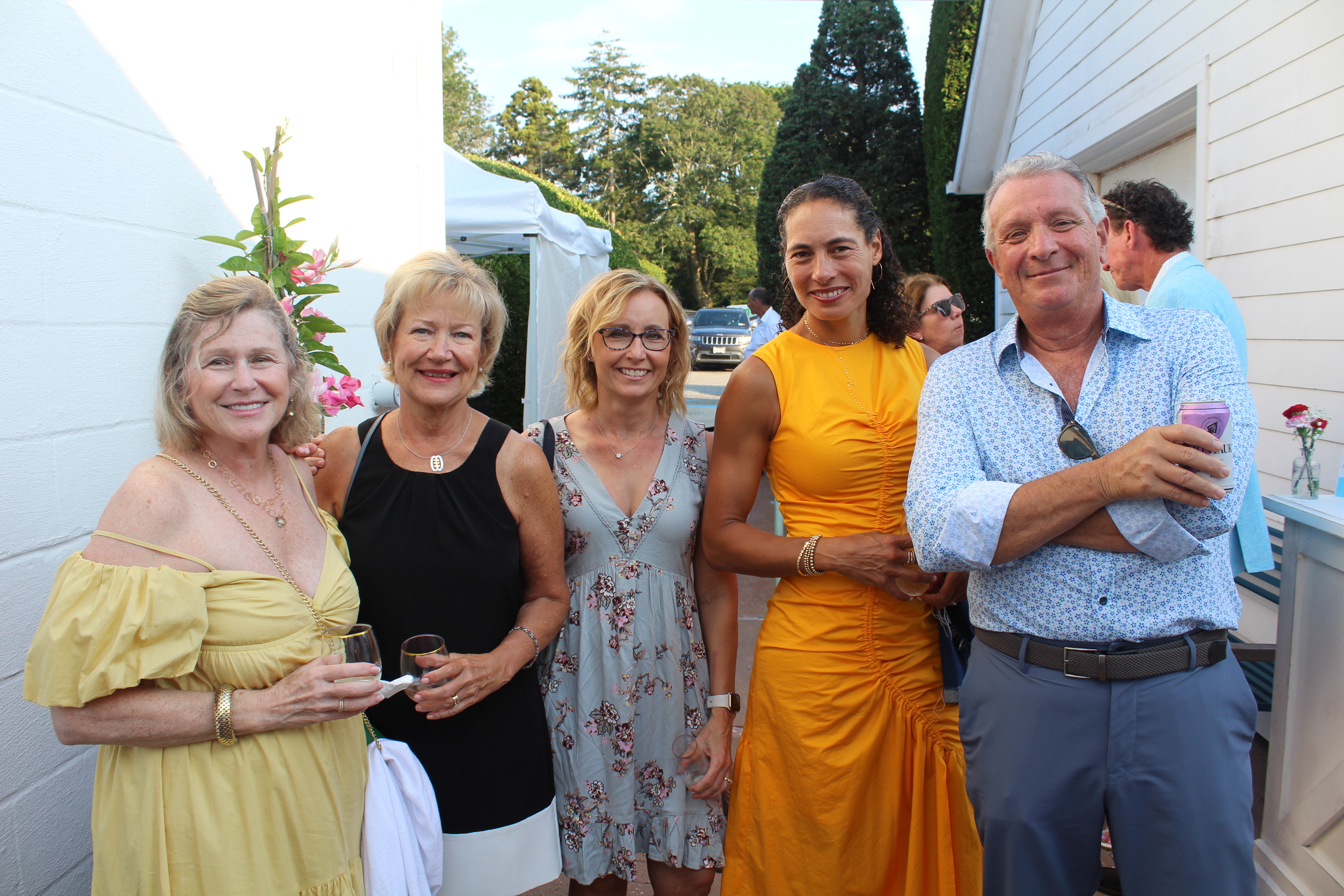 friends smiling at camera