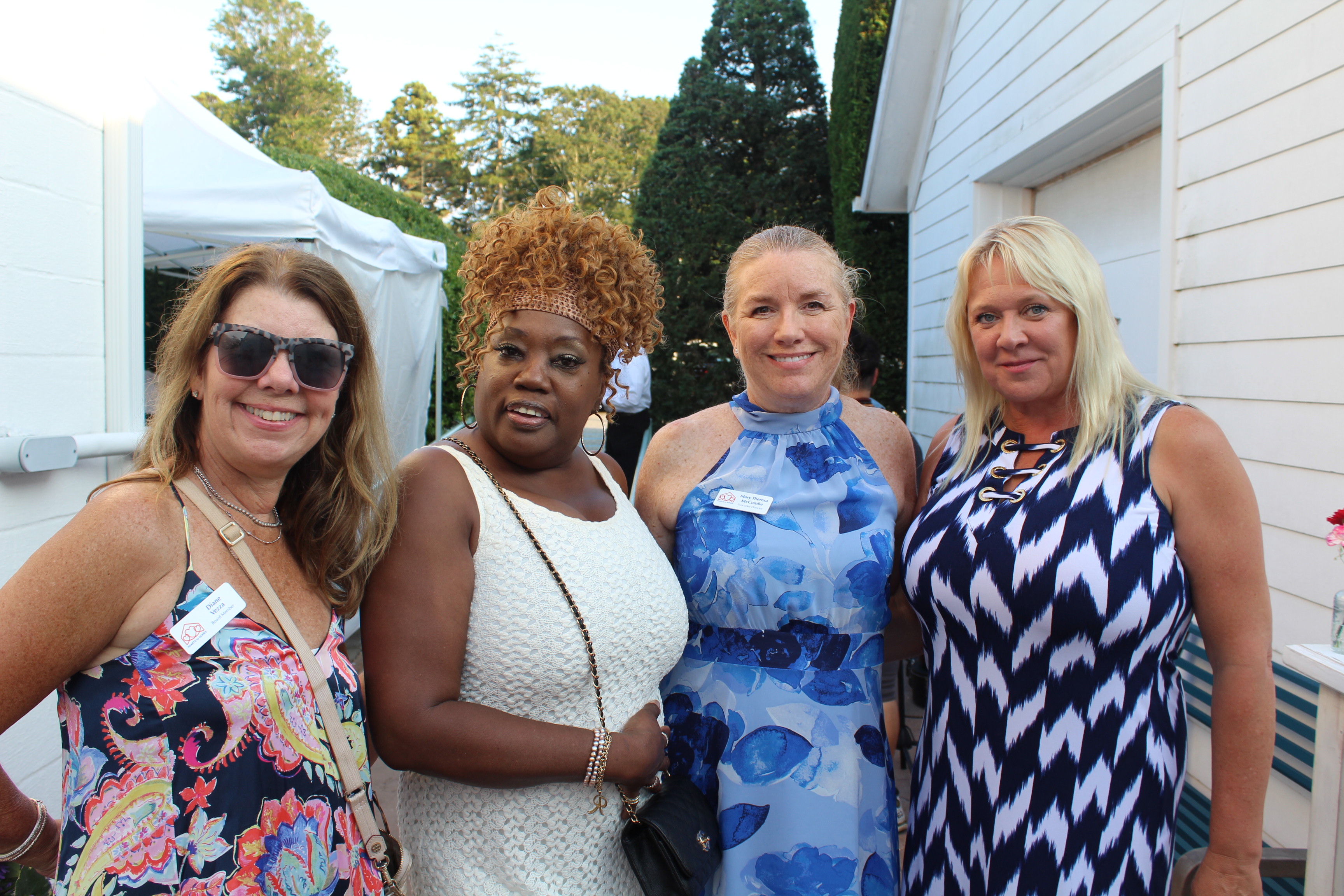 group of woman smiling at camera