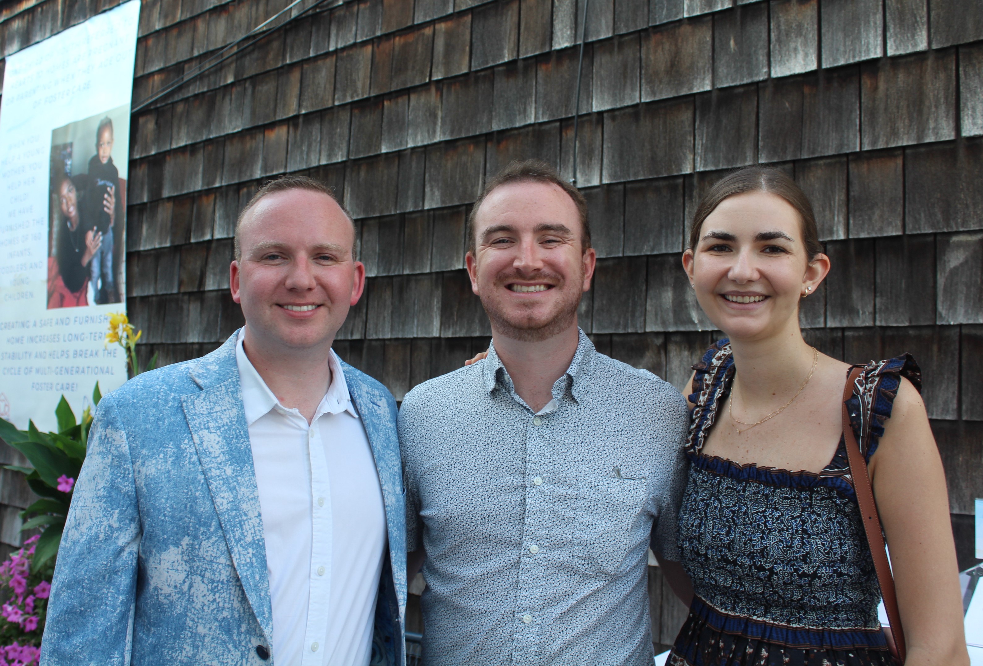 3 people smiling at camera